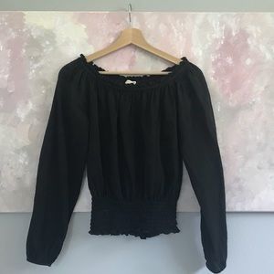 MICHAEL KORS Black off the shoulder top.